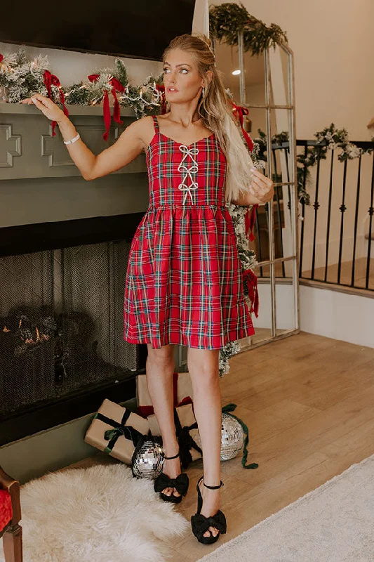 Plus size dresses with comfy flows feel gentle -Kiss Under The Mistletoe Plaid Mini Dress