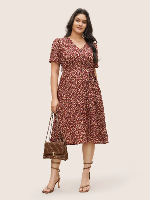 Plus size dresses featuring mesh overlays feel chic -Geometric Graphic Button Detail Pocket Dress