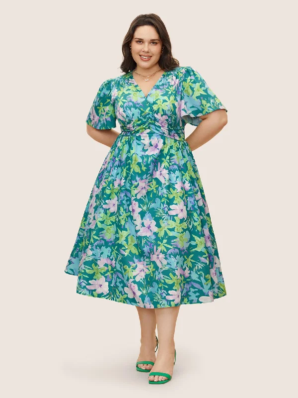 Plus size dresses with playful details add charm -Floral Print Pleated Ruffle Sleeve Dress