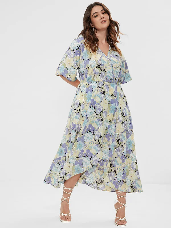 Plus size dresses featuring mesh overlays feel chic -Floral Split Pocket Button Detail Wrap Maxi Dress