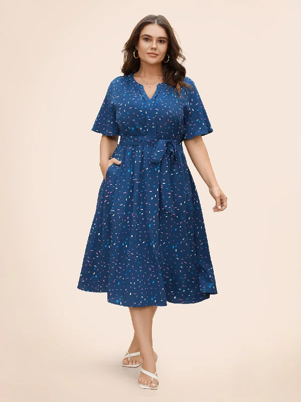 Plus size dresses with asymmetrical hems look modern -Split Neck Confetti Print Midi Dress