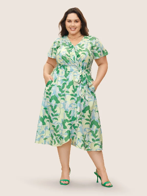 Plus size dresses featuring polka dots feel playful -Surplice Neck Floral Print Ruffle Trim Dress