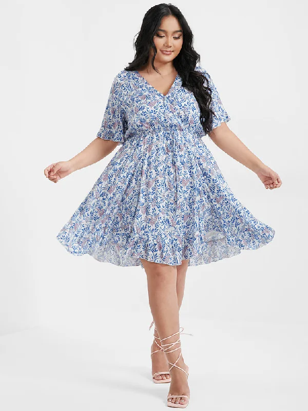 Plus size dresses with long sleeves cover comfortably -Ditsy Floral Ties Asymmetrical Ruffled V Neck Dress